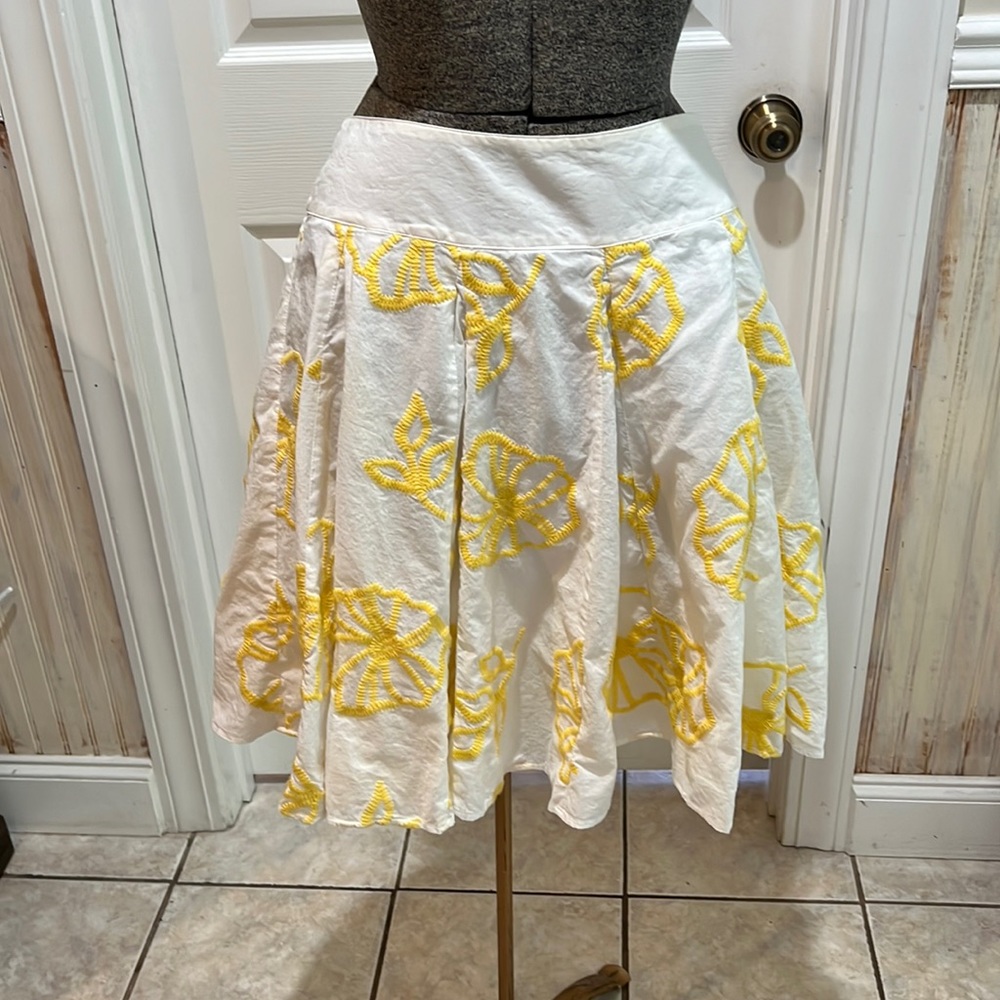 Gorgeous white skirt with yellow embroidered flowers